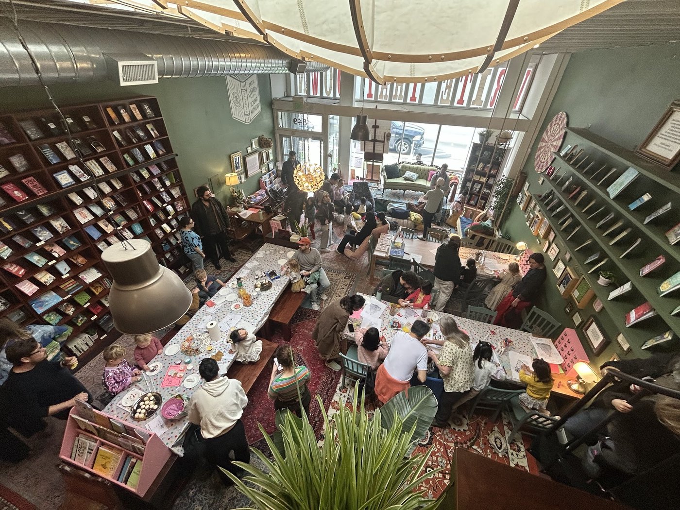 Aerial view of the International Library of Young Authors with youth gathered